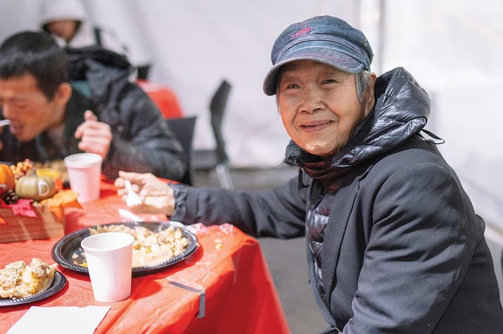 Guest enjoying Thanksgiving meal