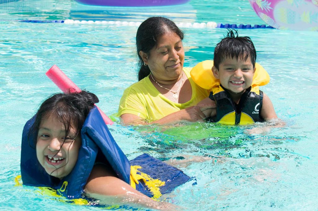 Family in pool