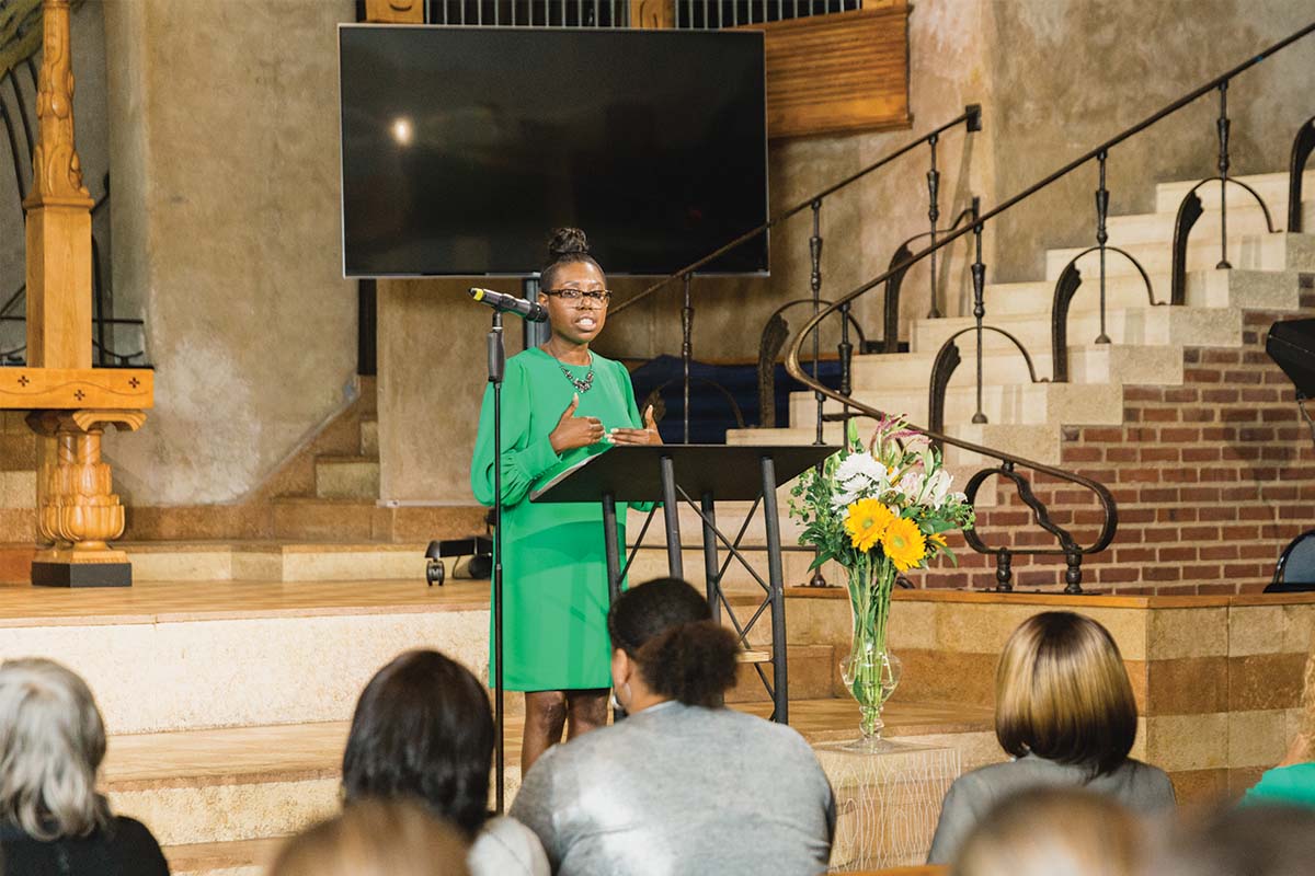 Denise speaking at graduation