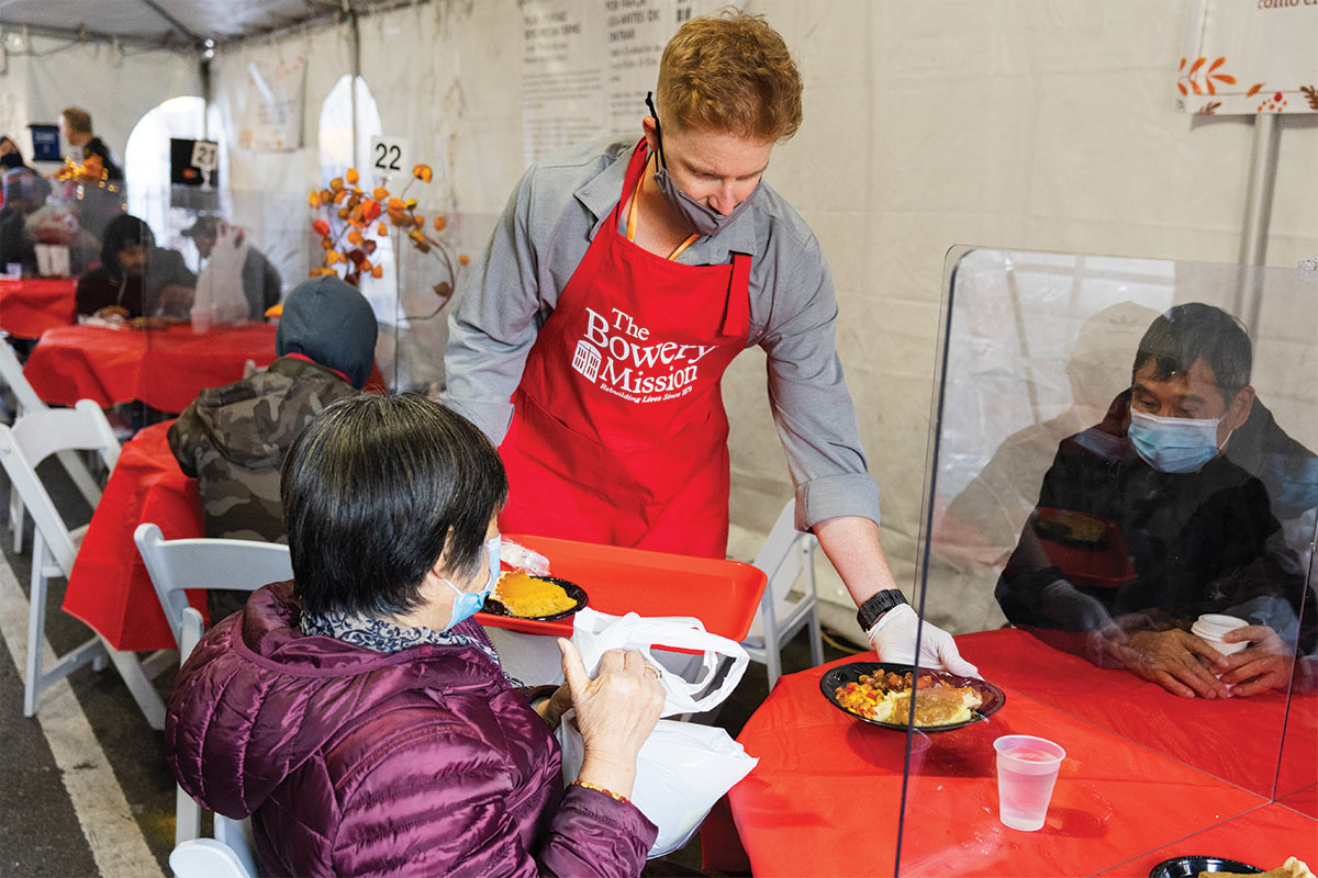 Volunteer serving guests