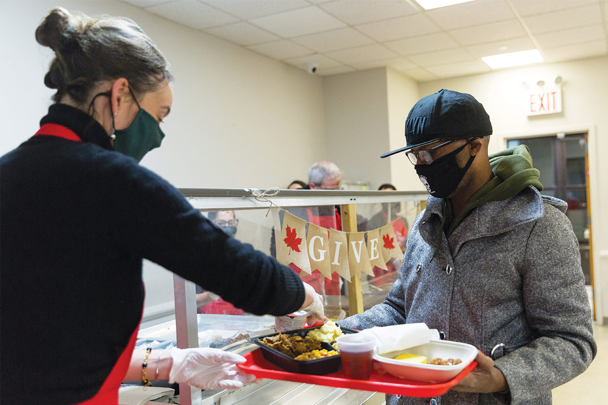 Volunteer serving guest