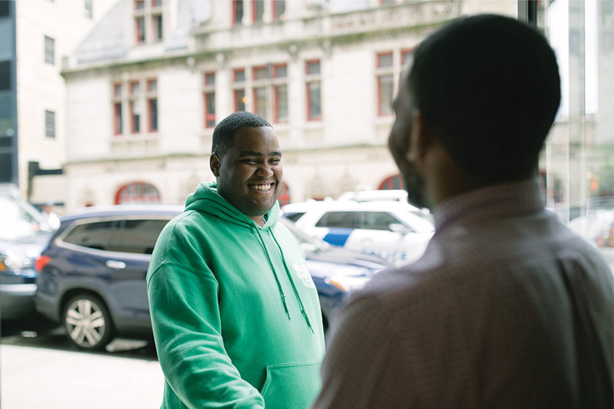 Guest being welcomed at The Bowery Mission