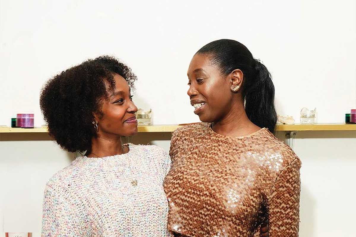 Denise and friend smiling